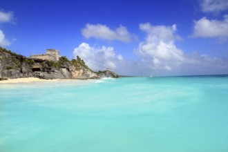 Ancient Mayan ruins temple of Tulum in Caribbean turquoise sea shore