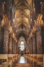 Illuminated Inside of St Magnus Cathedral at Kirkwall, Scotland, vertical shot