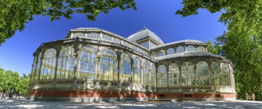 Panorama of Palacio de Cristal (Glass Palace) in Buen Retiro Park in Madrid, Spain, Europe