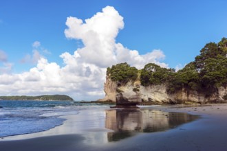 The far end of the earth. Travel to New Zealand. Ocean tide in the Cathedral Cove. Mirror