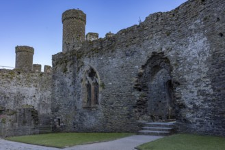 Conwy Castle, inner courtyard of the medieval castle ruins under a blue sky, Conwy, Wales, Great