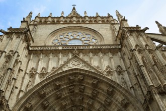 Seville cathedral facade in Constitucion avenue of Sevilla Andalusia Spain