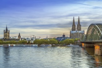 View of Historic center of Cologne with Hohenzollern Bridge from Rhein river, Germany, Europe