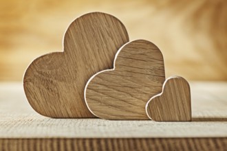 Wood hearts on wooden background