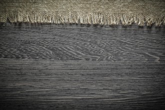 Vintage sacking on wooden board