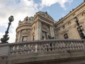 Entrance to the Opéra Garnier with baroque architecture and lanterns, Paris, France, Europe
