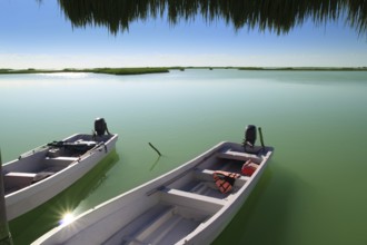 Boats in pier mangrove lagoon in Mayan Riviera sian kaan