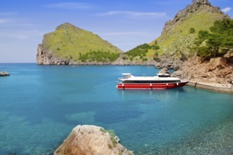 Escorca Sacalobra beach in north Mallorca with boat in balearic Spain