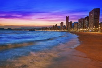 Benidorm skyline at sunset beach in Alicante of Apain