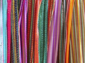 Indian colorful scarf in a row scarves vivid colors stripes