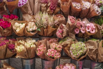 Bundled bouquets in front of a flower shop, Germany, Europe