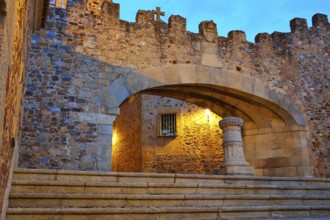 Caceres Arco de la Estrella Star arch sunset in Spain entrance to monumental city