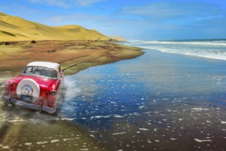 A vintage pink car on a sandy road with dunes and ocean background. Back view of a car. Copy space