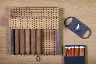 Luxury Cuban cigars on the wooden table
