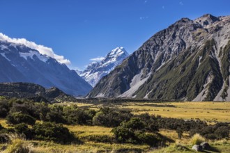The concept of active, walking and photo tourism. The top of the mountain is covered with eternal