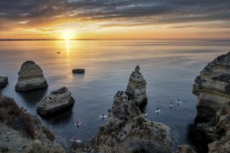 Lagos Praia da Balanca, Portuguese coast near the city of Lagos in the light of the rising sun