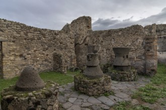 Pompei, Italy, 25 November, 2023: traditional storage pots among the ruins of the ancient city of