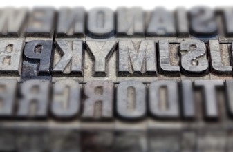 Hot metal printing setting, old letters made of lead for letterpress printing, Lettern aus dem