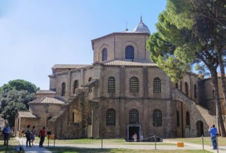 Tourists admire a prime example of early Christian architecture, the octagonal Basilica of San