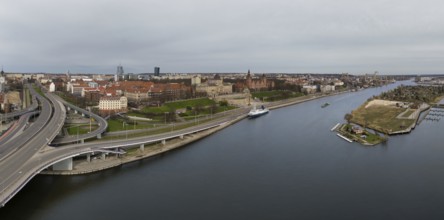 Aerial view of Chrobry Shafts, moored ships on the Oder River and castle like buildings of National