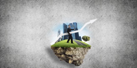 Conceptual image of young and confident business man in suit holding big white arrow in hands while