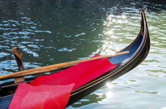 Ancient gondolas in Venice. Close up black gondola