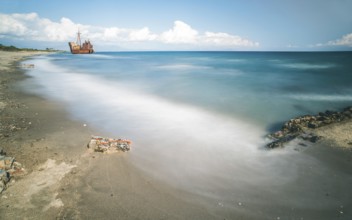Old rustic big ship. Blue sky