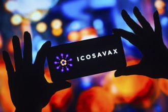 In this photo illustration, the Icosavax logo is displayed on a smartphone mobile