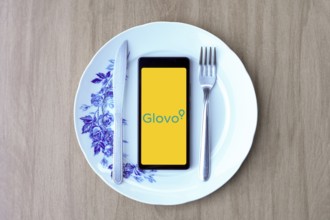 April 29, 2024, Brazil. In this photo illustration, the Glovo logo is displayed on a smartphone