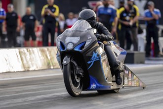 Sep 22, 2023-Concord, NC: NHRA Pro Stock Motorcycles Series driver, Kelly Clontz, runs down the
