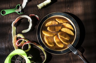 Apples in caramel. Natural light from window