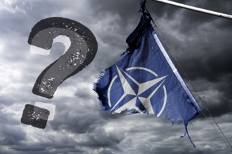 Torn NATO flag with question mark, photomontage