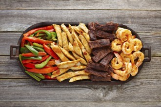 Mexican combo beef and chicken fajitas with shrimp