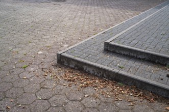 Wide steps on paved square