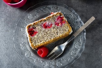 Poppy seed cake with raspberries and desiccated coconut