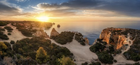 Praia da Mesquita, Portuguese coast near the city of Lagos in the light of the rising sun