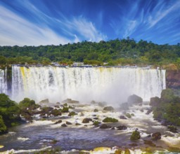 Incredible exotic waterfalls of Iguazu on the border of Brazil, Argentina and Paraguay. Concept of