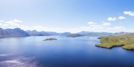 Lake Burbury and surrounding mountain landscape on a warm summer's aftenoon near Queenstown in