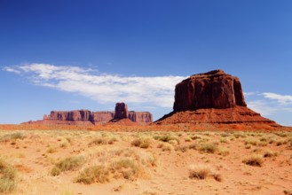 Very hot day in Monument Valley - Iconic peaks of rock formations in the Navajo Park, Utah