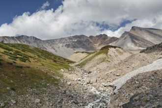 Summer volcanic landscape of Kamchatka Peninsula: beautiful view of Dzenzur Volcano, active volcano