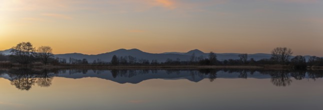 Autumn landscape of trees reflecting in the water at sunset. Autumn landscape. Bas-Rhin, Alsace,