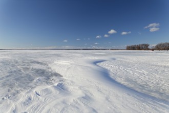 Nature, frozen riverscape with snow drifts, Province of Quebec, Canada, North America