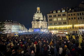 32nd Christmas Vespers and historic Christmas market on Neumarkt square in front of the