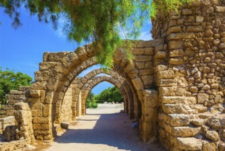 Superbly preserved ancient arched ceiling of stalls. National park Caesarea on the Mediterranean.