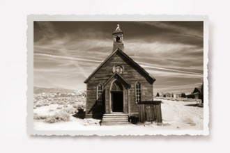 This small chapel made of weather-beaten boards stands on the edge of a dusty road in Bodie. Photo