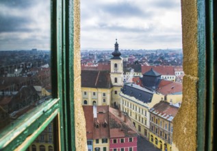 Suning view to Sibiu historic center and Holy Trinity Roman Catholic Church viewed from the