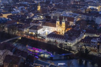 Evening atmosphere, view from the Schlossberg to the illuminated Murinsel and the