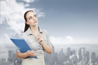 An image of a beautiful business woman in front of the big city