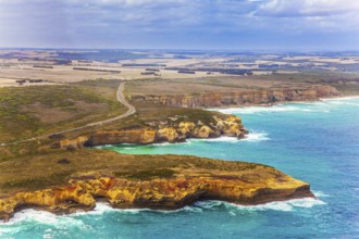 Scenic coastline. Picture taken from a helicopter. Great Ocean Road and the Twelve Apostles is a
