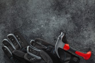 Gloves And Mini Safety Claw Hammer Coposed With Copy Space